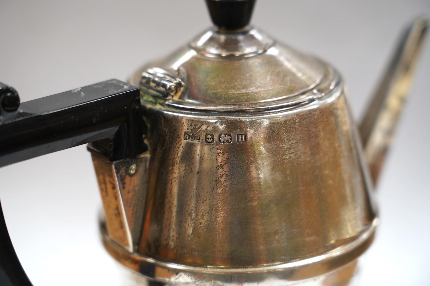 A George V Art Deco silver coffee pot, A L Davenport Ltd, Birmingham, 1932, height 16.9cm, gross weight 10.8oz. Condition - fair